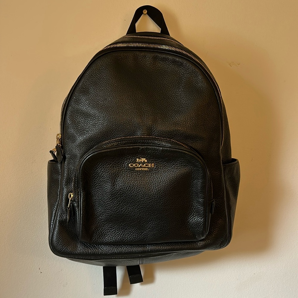 Black coach backpack. Measurements in photos. In good used condition.